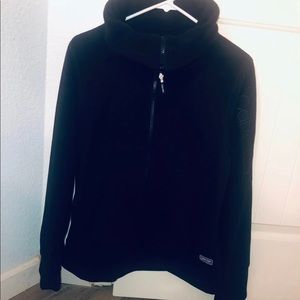black sweatshirt.